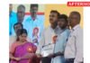 Health Minister presents awards to TANSACS quiz einners